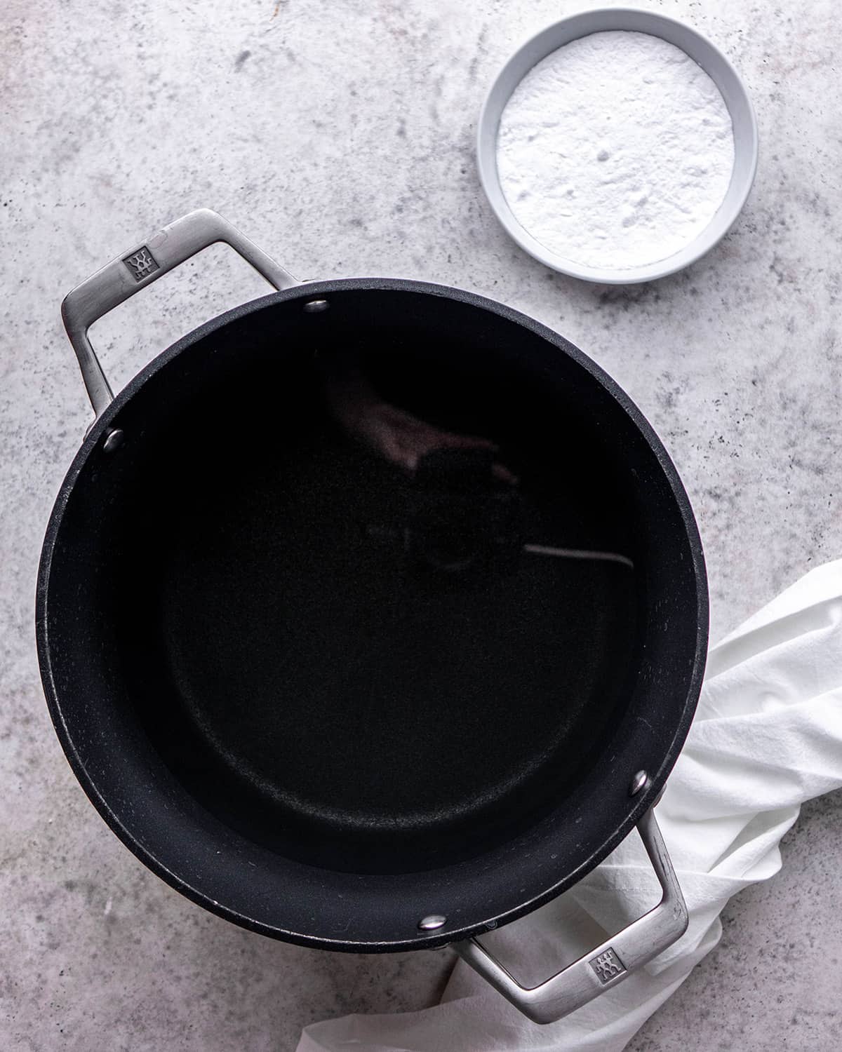 two photos showing how to make the water bath for this soft pretzel recipe