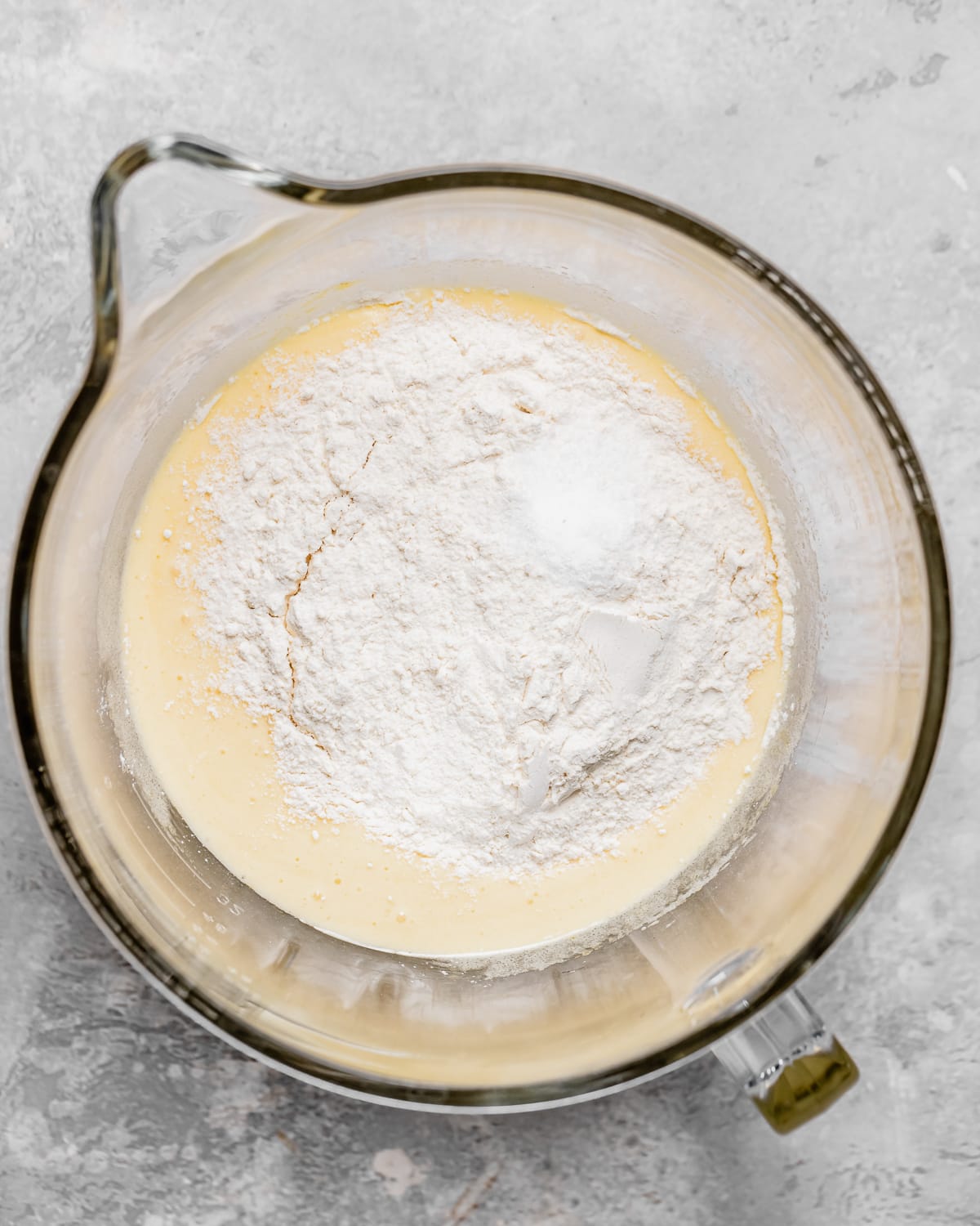 how to make White Chocolate Brownies - adding dry ingredients to the wet ingredients