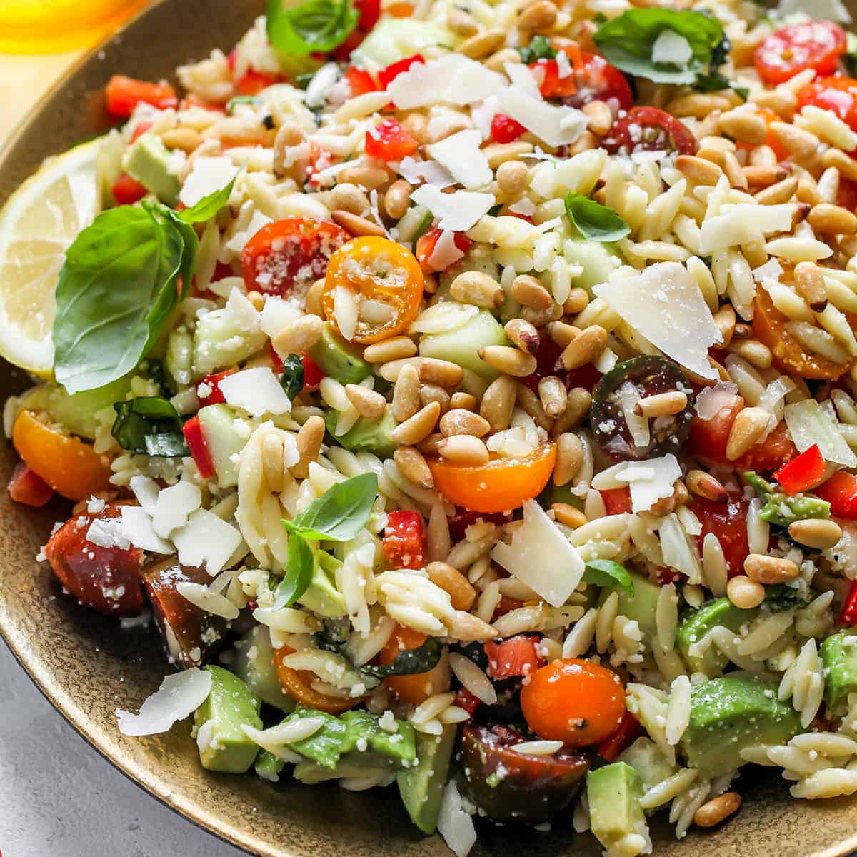 up close view of lemon orzo salad in a bowl