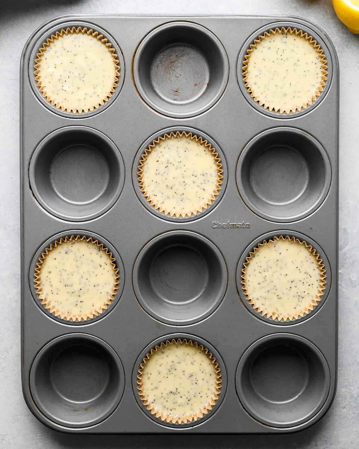 Lemon Poppy Seed Muffins in a muffin pan before baking