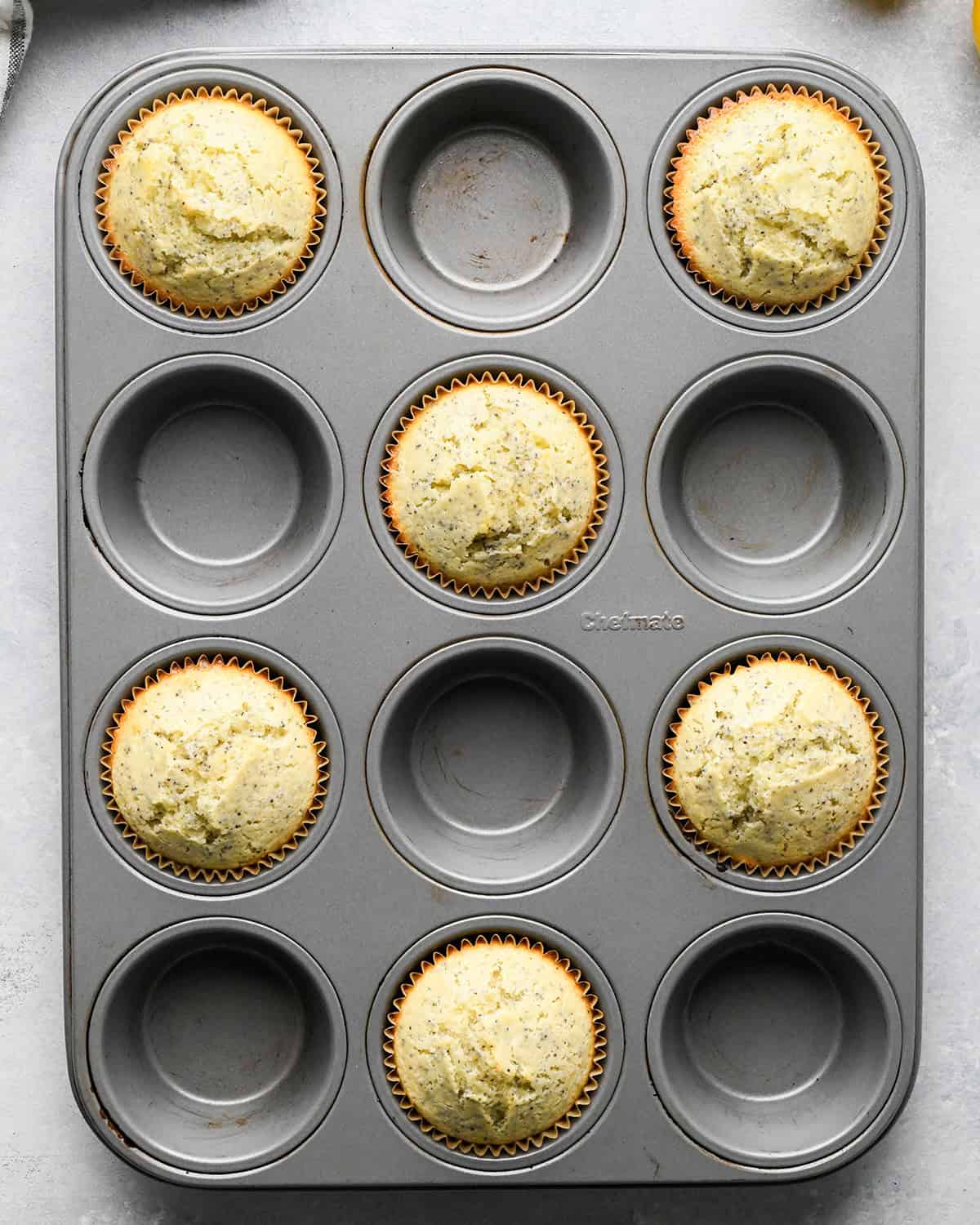 Lemon Poppy Seed Muffins in a muffin pan after baking
