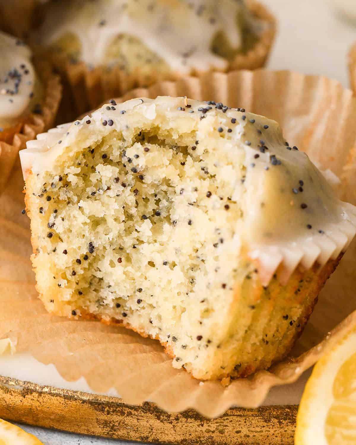 a Lemon Poppy Seed Muffin with a bite taken out of it