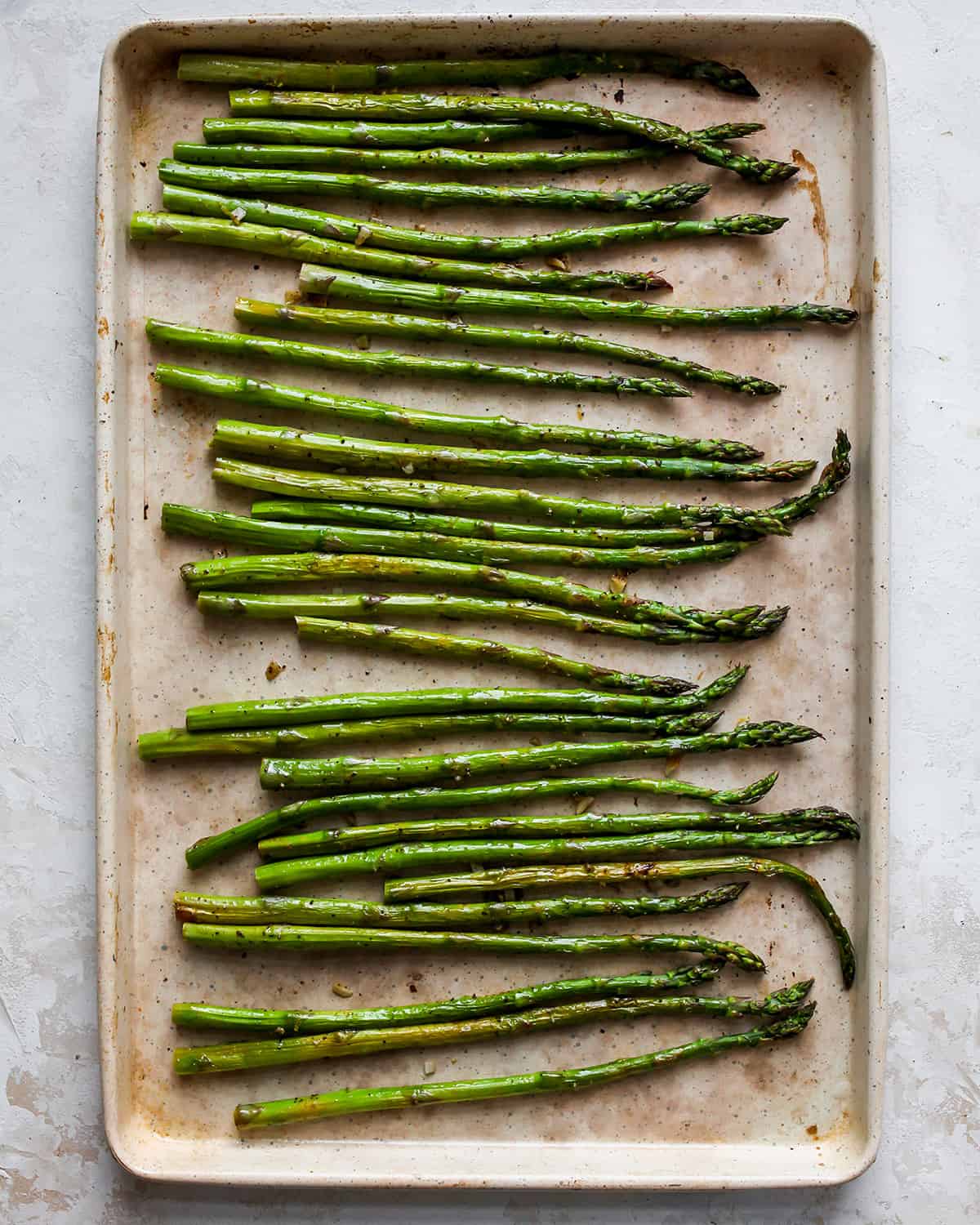 photo showing How to Roast Asparagus - asparagus on the baking sheet, roasted.