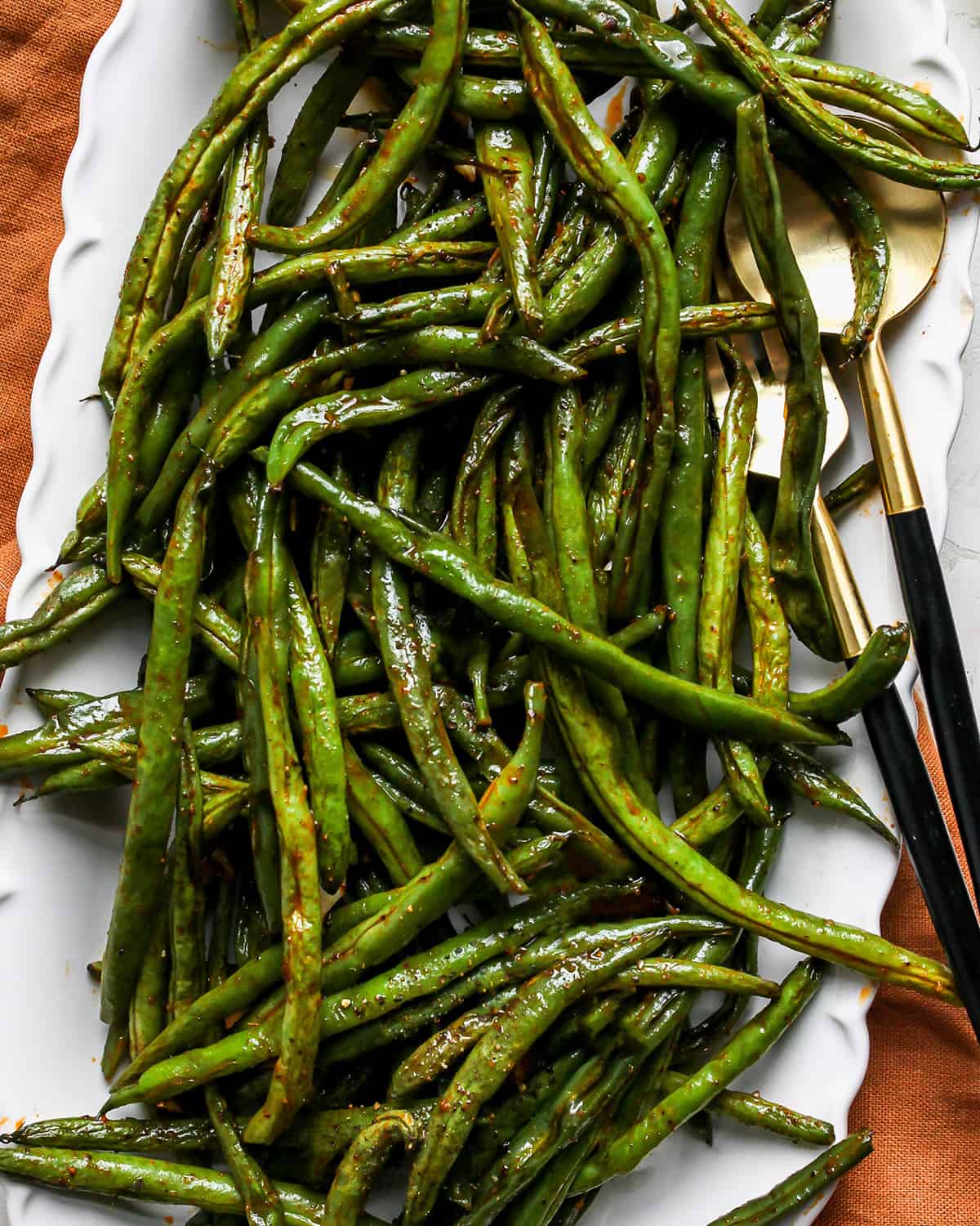 Oven Roasted Green Beans on a white serving dish