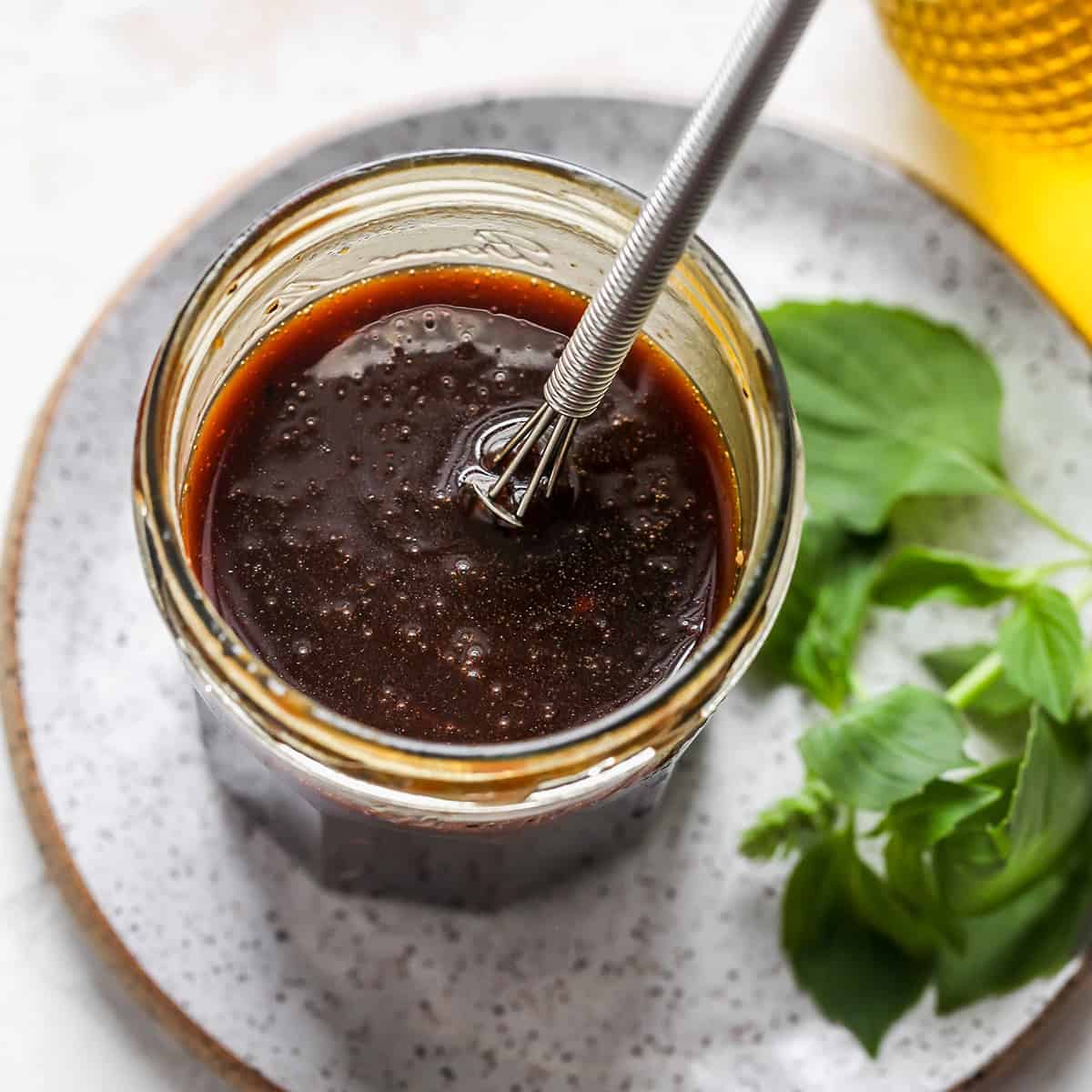 the dressing for this Panzanella Salad Recipe in a glass jar