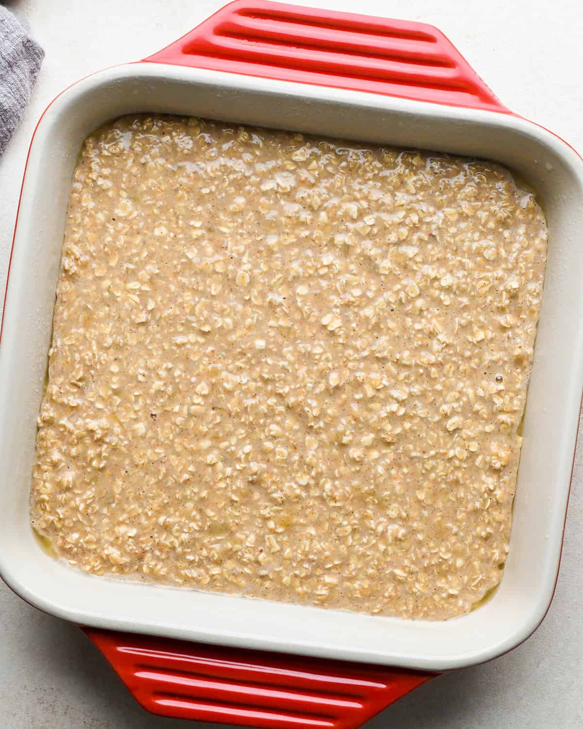 Peanut Butter Banana Baked Oatmeal in a baking dish before baking