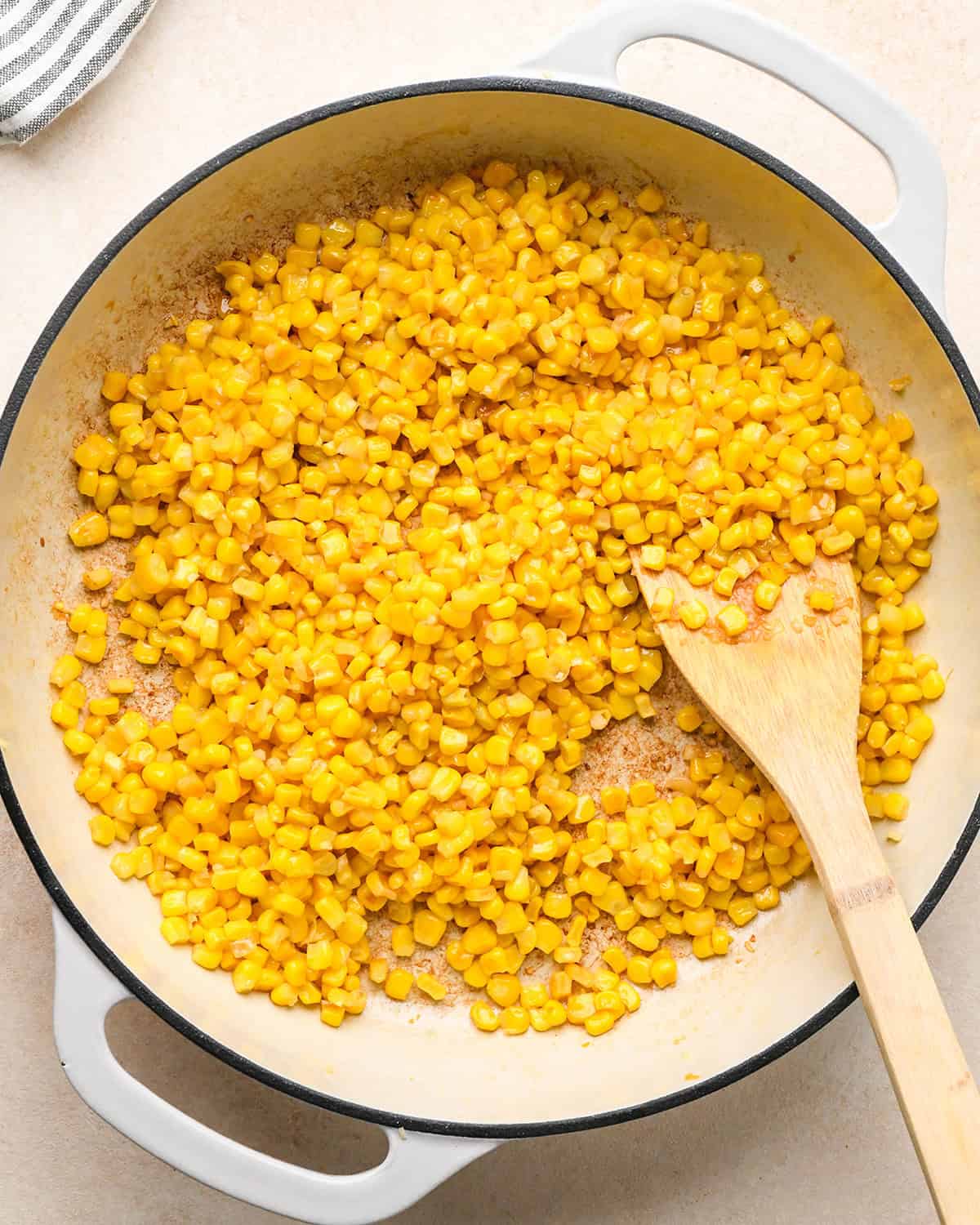 How to Make Corn Salsa - corn and garlic toasted in a pan