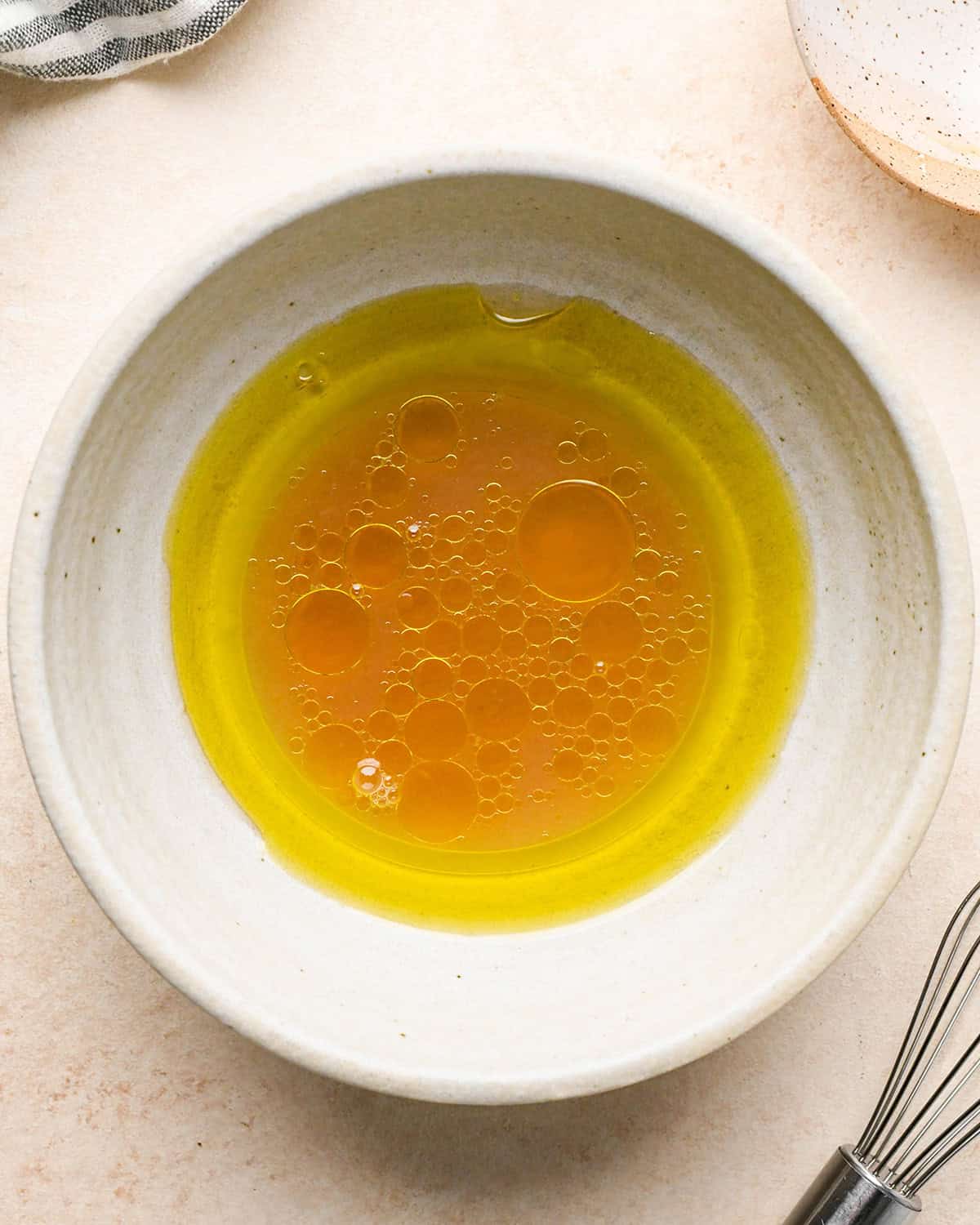 How to Make Corn Salsa - dressing ingredients in a bowl before whisking