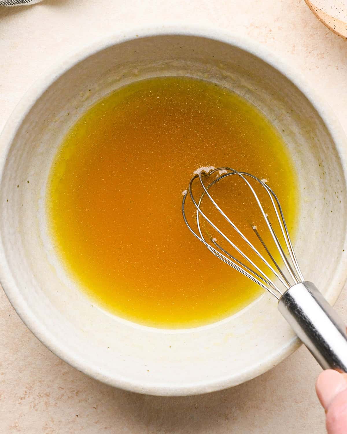 How to Make Corn Salsa - dressing in a bowl with a whisk