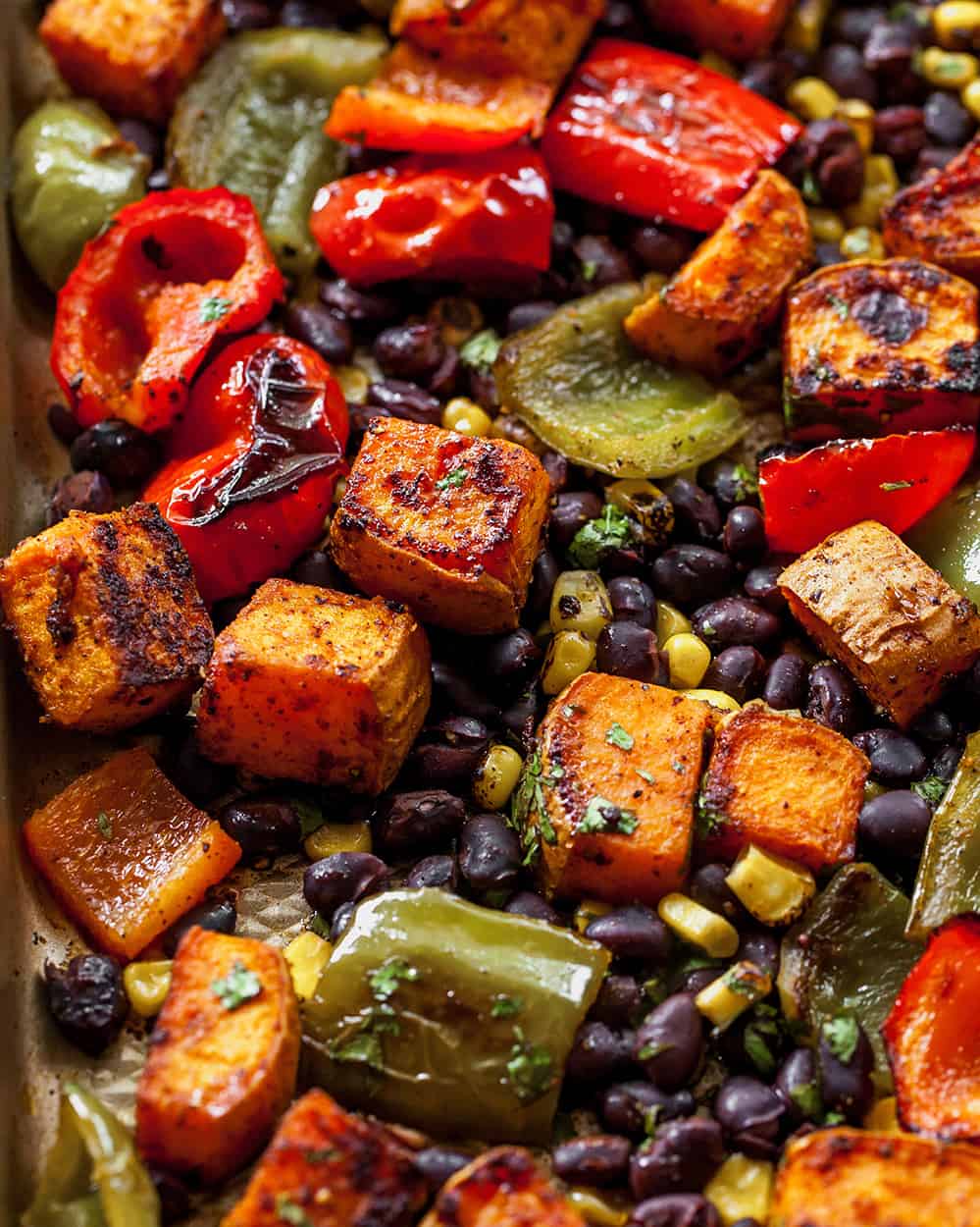 black bean sweet potato tacos on a baking sheet