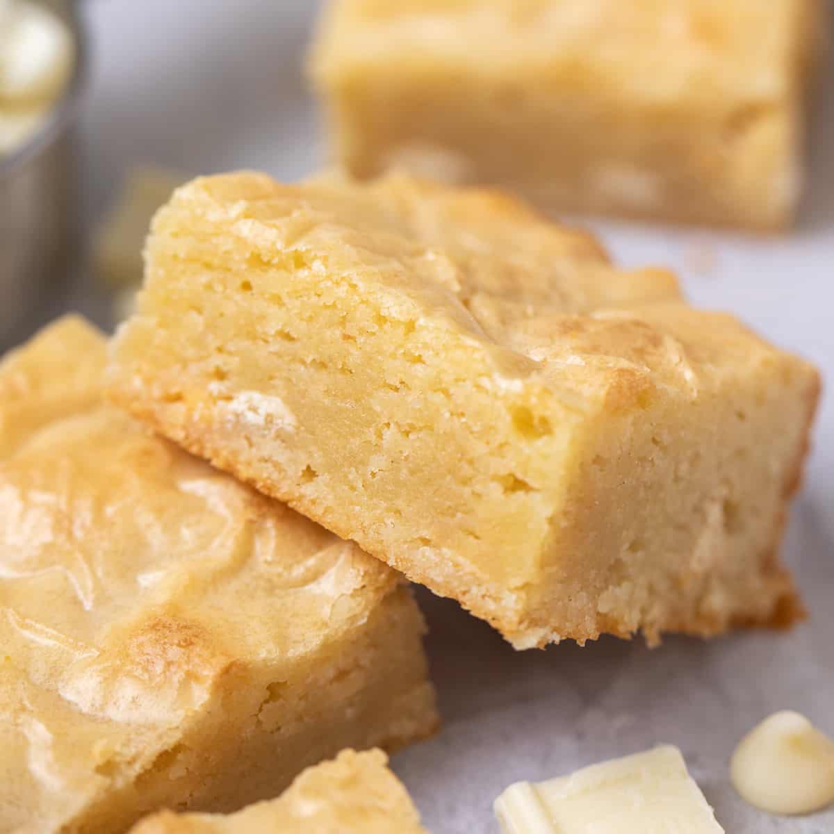 a White Chocolate Brownie resting on another brownie
