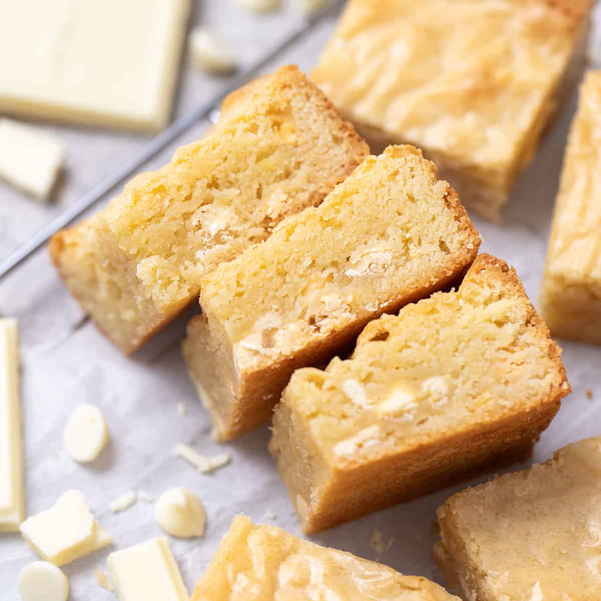 3 White Chocolate Brownies on their side surrounded by 4 other brownies